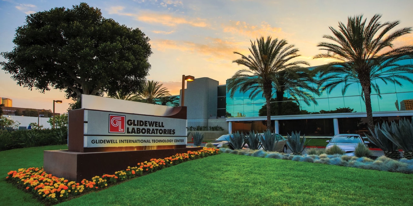 The Glidewell Laboratories sign outside the Glidewell International Technology Center at sunset